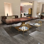 Molten Gold Pedestal Dining Table with Deep Red Burl Wood Top and Inlaid Motif
